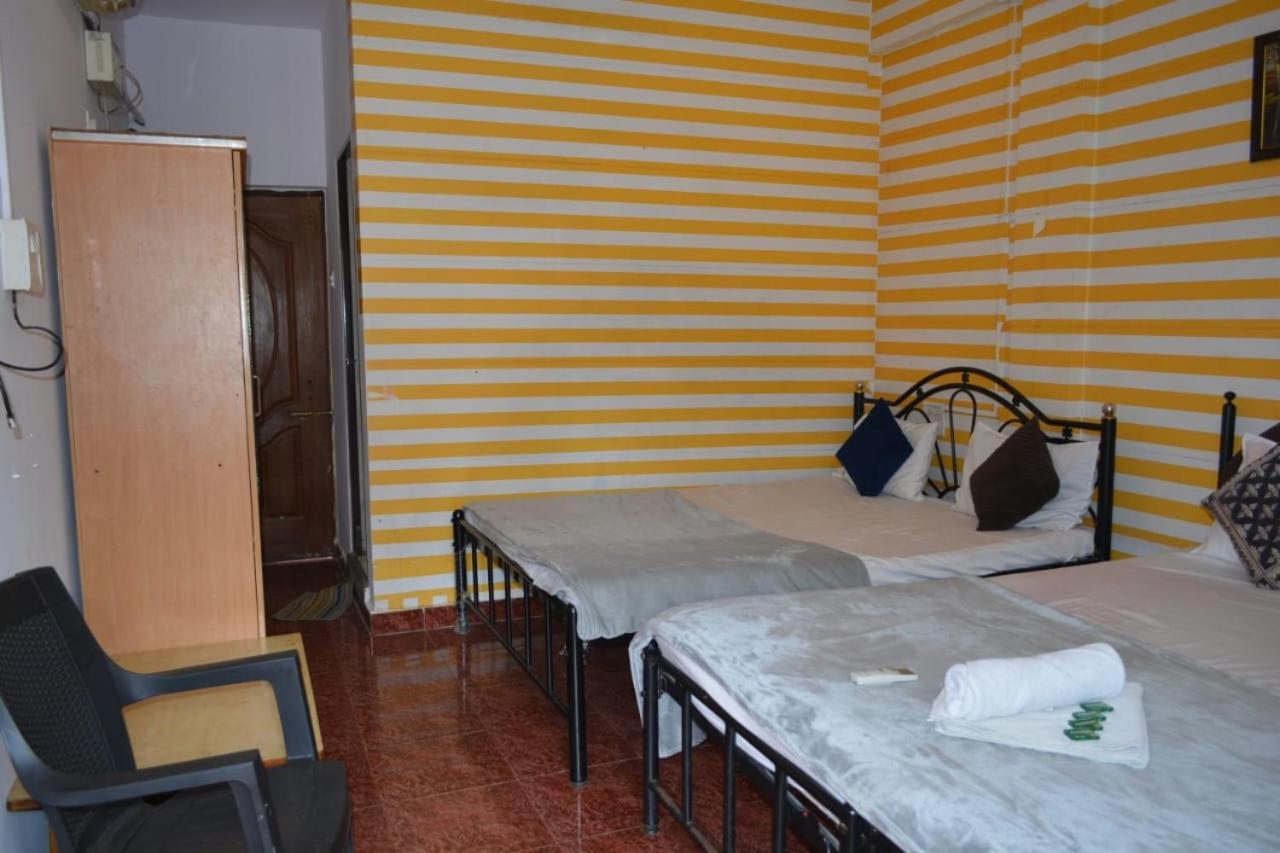 Esther Guest House Калангут Номер фото