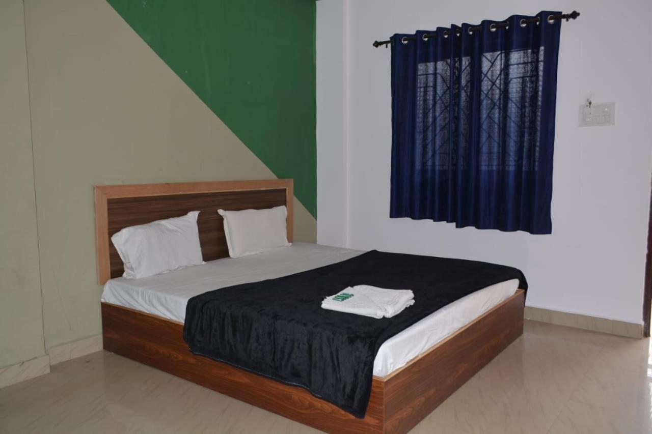 Esther Guest House Калангут Номер фото